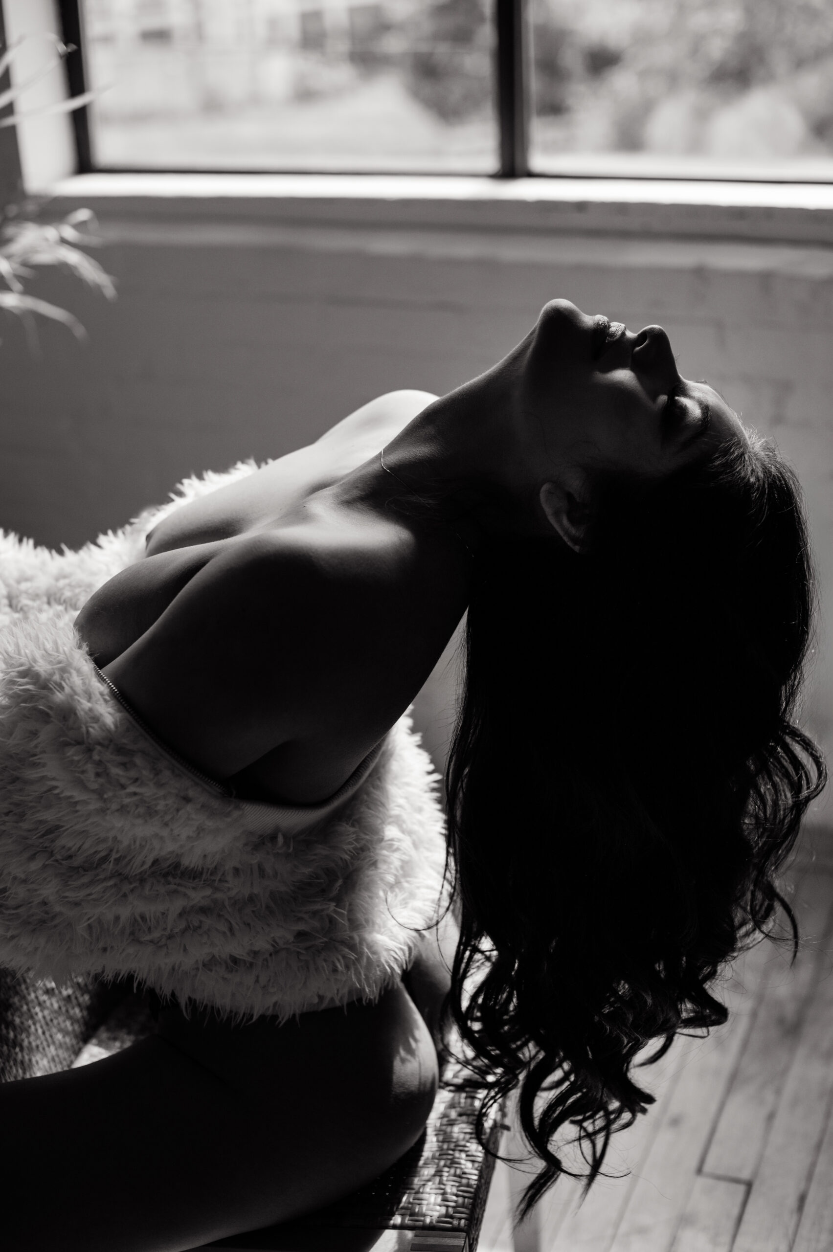 Jessie's empowering boudoir session with bold black and white lighting.